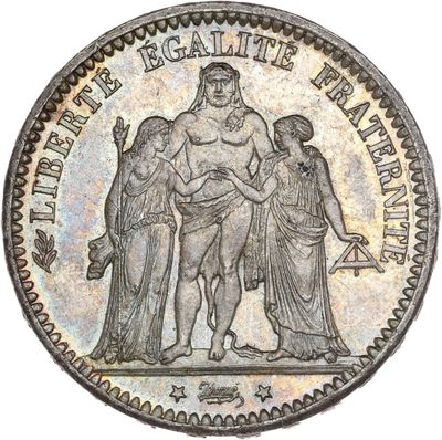 a silver coin with an image of a man and woman on it
