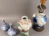 three vases sitting next to each other on a table