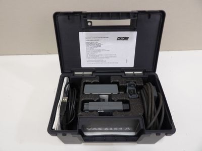 a close up of a black case with wires in it on a table