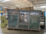 a large display case in the middle of a warehouse filled with boxes