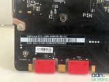 a close up of a computer board with a barcode on it