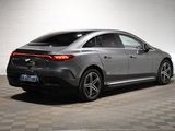 the rear end of a silver mercedes cla parked in a garage