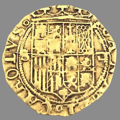 l'image d'une pièce d'or sur laquelle figurent des armoiries