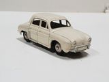a toy car that is sitting on a white surface