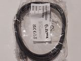 a black cable that is wrapped in plastic on a table