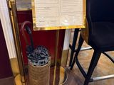 two chairs and a table with a menu on it