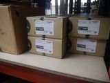 several boxes are stacked on top of each other on a table