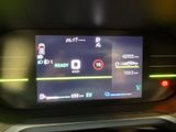 the dashboard of a car with a digital display on it ' s dashboard