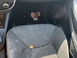 the interior of a car with the seat up and the front seat down