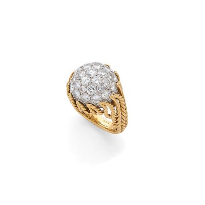 a diamond and gold ring, by van cleef