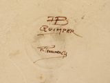 a close up of a plate with writing on it