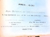 une pancarte sur le côté d'un immeuble indiquant « prix 30 »