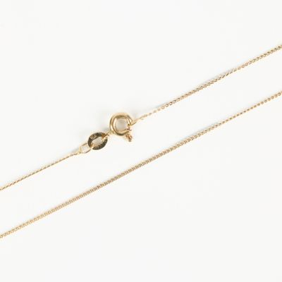 a gold chain with a clasp on a white background