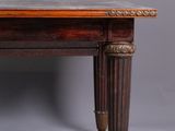 an old wooden table with two legs and a wooden top