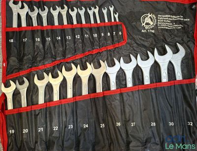a picture of a set of wrenches in a case