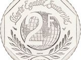 a close up of a coin with the number twenty on it