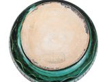 an image of a green and white bowl sitting on top of a white surface