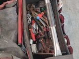 a bag with tools inside of it on the ground