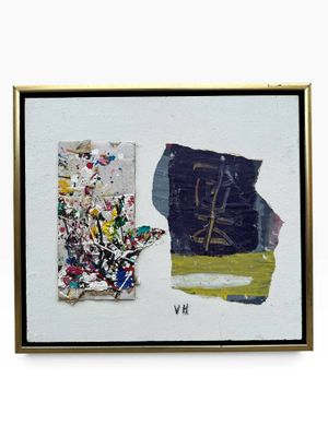 painting on a white wall with a gold frame and a black and yellow painting