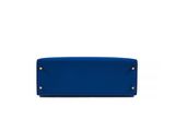 a blue purse on a white background
