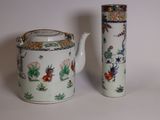 a tea pot and a tea pot sitting next to each other