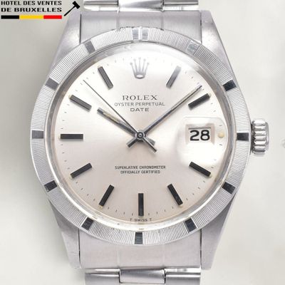 an image of a stainless steel watch with a white dial