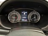 the dashboard of a car with a few gauges on it