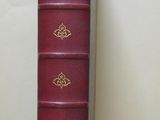 a red book that is sitting on a table