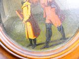 un tableau représentant un homme et une femme vêtus d'un manteau jaune