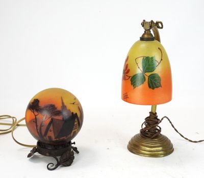 two lamps that are sitting next to each other on a table