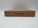 a close up of a box on a table with a white background