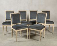 Six chaises en bois naturel peint blanc,, l'assise et le dos…