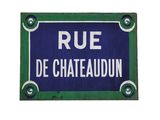 a blue sign that says rue de chateaudon on it