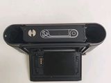 a black camera that is sitting on top of a table