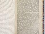 an open book that has a picture of a cat on it