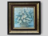 painting of a vase of flowers in a gold frame on a gray wall