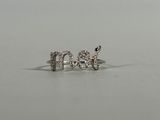 a close up of a diamond ring with the word mom on it