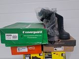 a pile of boxes and a pair of boots on top of each other