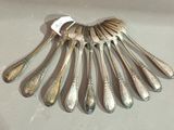 a lot of spoons that are sitting on a table