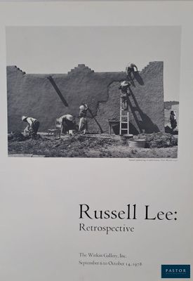an image of a black and white photo of a man on a ladder
