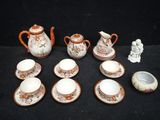 an image of a group of tea and coffee cups and saucers