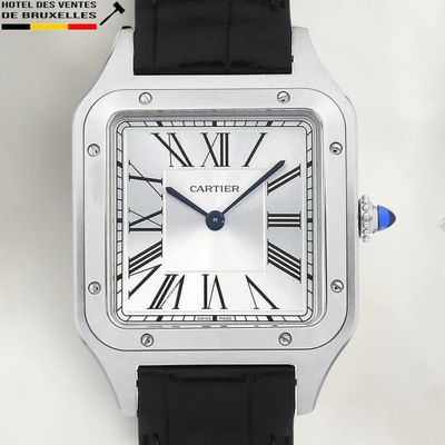 une image d'un gros plan d'une montre-bracelet avec des chiffres romains
