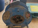 a blue machine that is sitting on a table