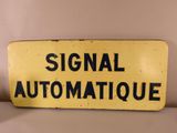 an old yellow sign with the words signal automatique on it