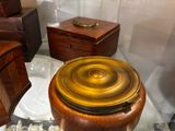 a toilet with a wooden seat and a wooden lid