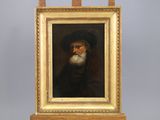 an old painting of a bearded man with a beard and a hat on a wooden easel