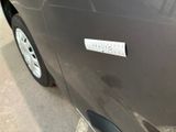 a sticker on the side of a car with a sticker on it