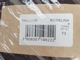 a label on a piece of fabric that is wrapped in plastic