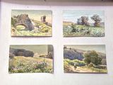 quatre tableaux représentant des moutons dans un pré, accrochés sur un mur blanc