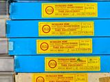 several stacks of blue boxes stacked on top of each other